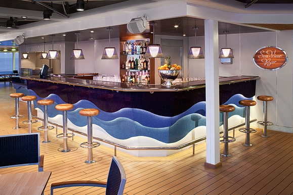 MyCruise Holland-America-Line Nieuw-Amsterdam Offentlige-arealer Barer-lounger-atrium3