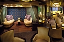 MyCruise Holland-America-Line Nieuw-Amsterdam Offentlige-arealer Barer-lounger-atrium4